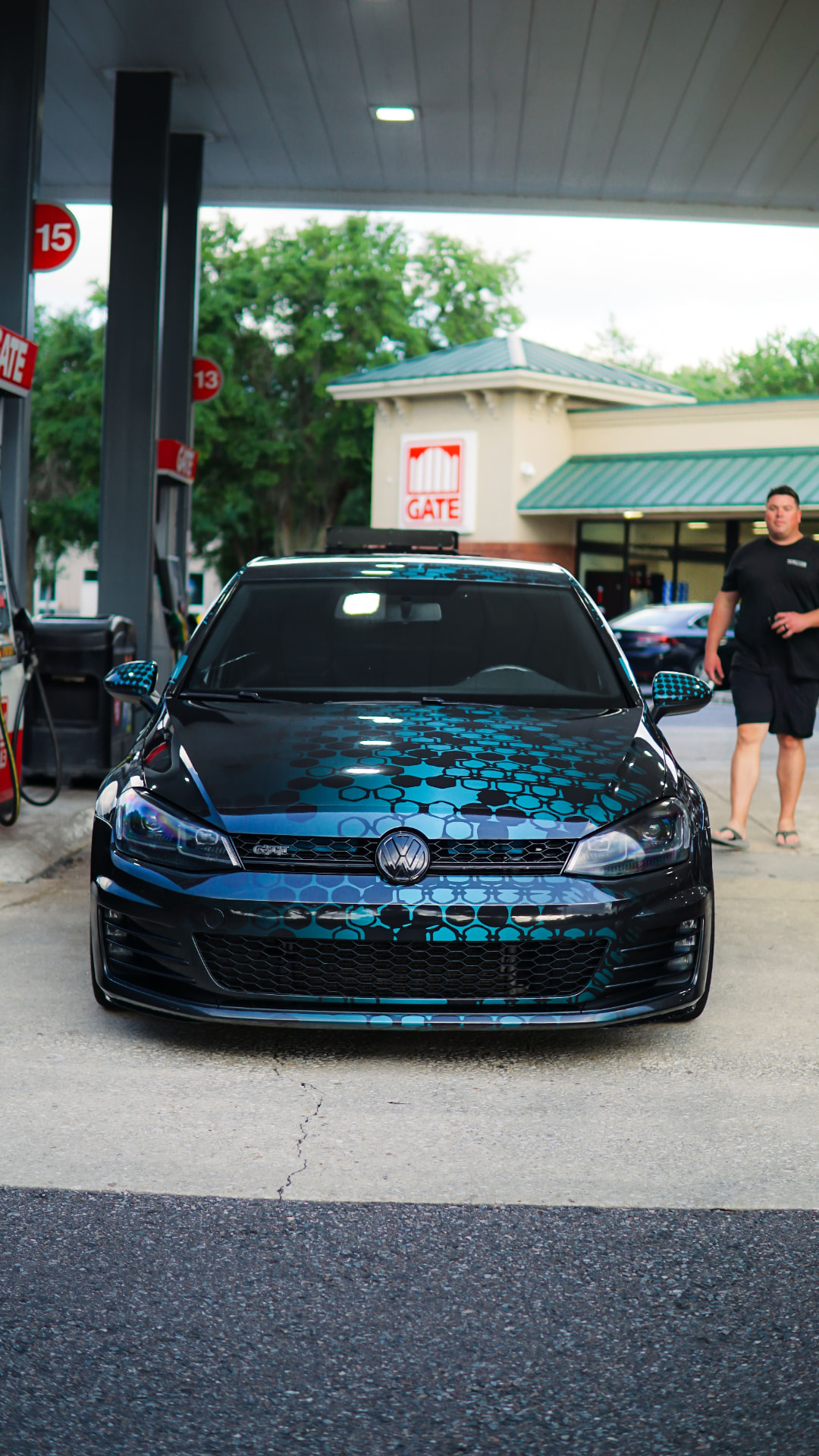 Volkswagen with blue custom graphics